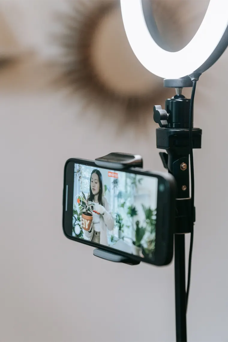 Saving a video on a phone with Reels Downloader