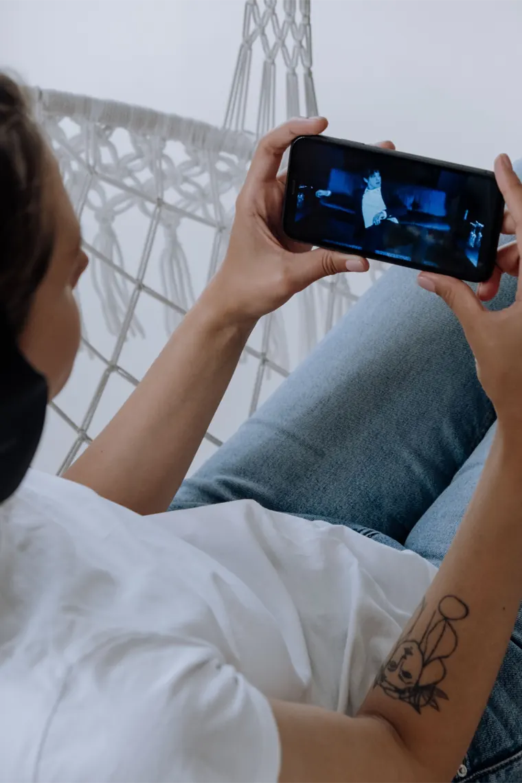 Saving a video on a phone with Reels Downloader