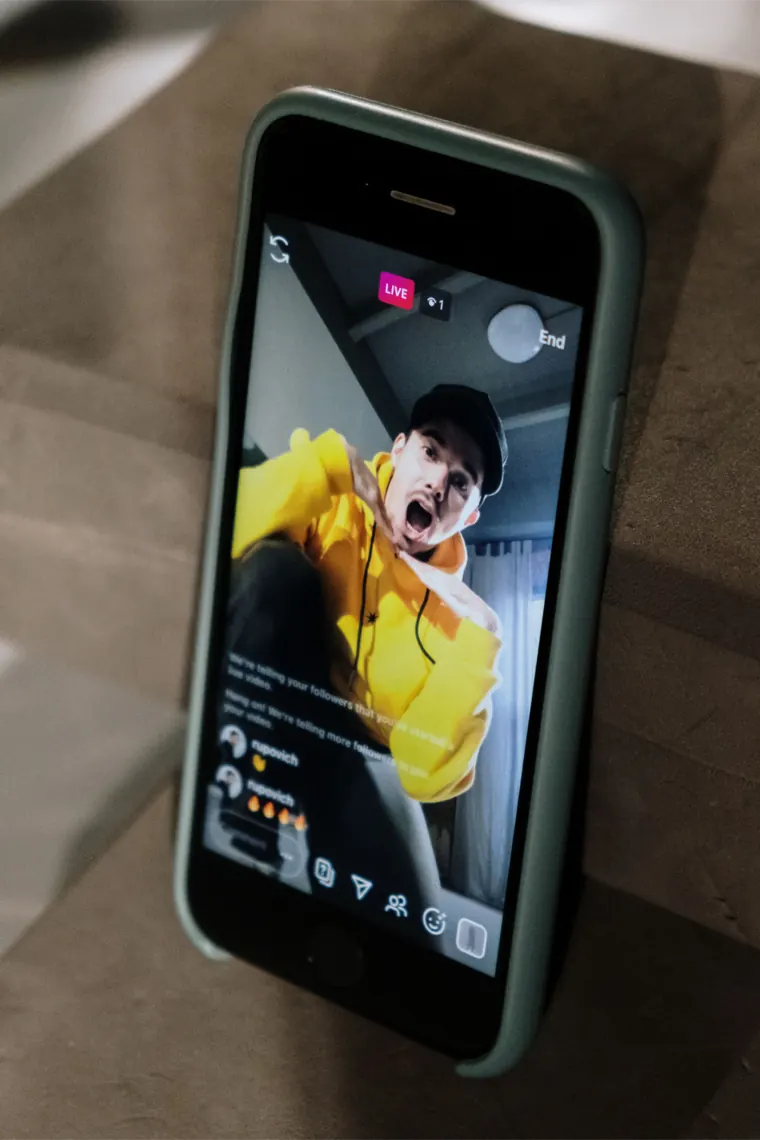 Saving a video on a phone with Reels Downloader