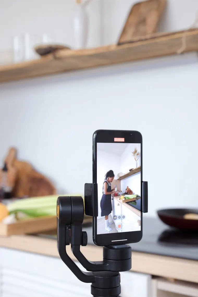 Saving a video on a phone with Reels Downloader